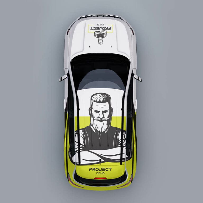 Top-down view of a car with MyJoinery’s custom graphic design featuring a bearded man illustration and the text ‘PROJECT DEMO.’