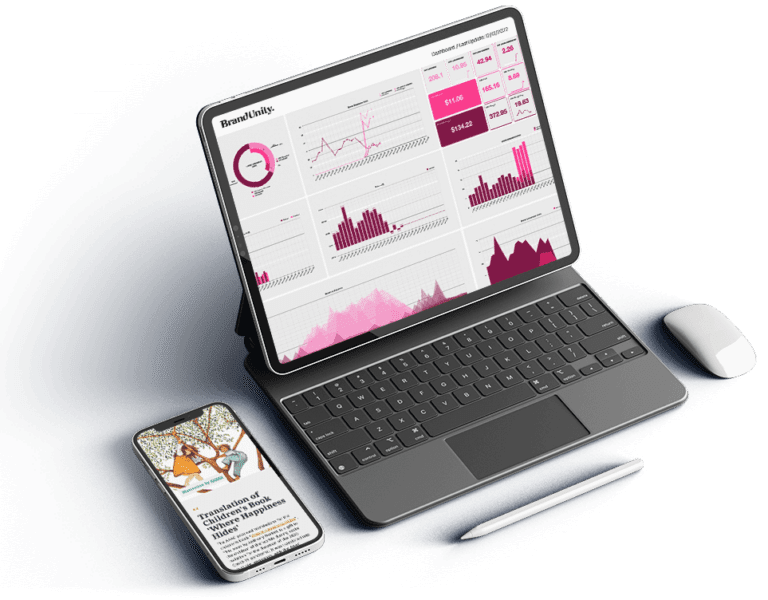 A laptop showing am analytics dashboard alongside a mobile phone displaying a website