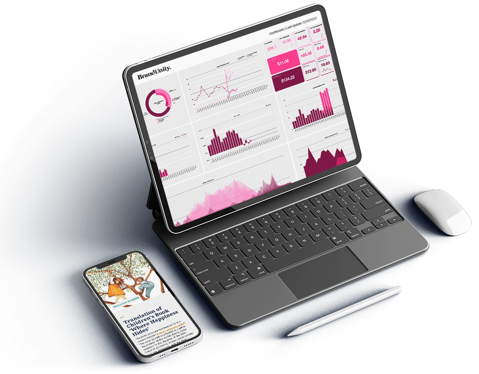 A laptop showing am analytics dashboard alongside a mobile phone displaying a website